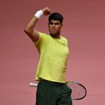 Carlos Alcaraz celebrates a point during a friendly match with Jannik Sinner in Korea. Australian Open 2026 betting guide featured image