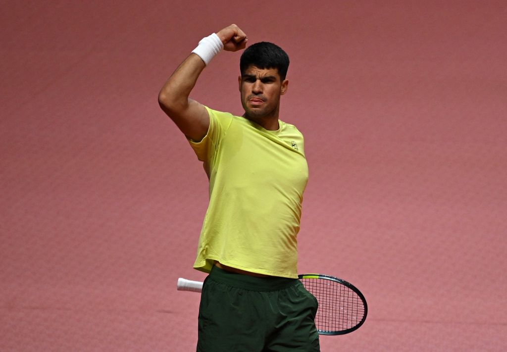 Carlos Alcaraz celebrates a point during a friendly match with Jannik Sinner in Korea. Australian Open 2026 betting guide featured image