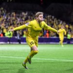 Jens Petter Hauge celebrates after scoring against Inter Milan during the first leg of the UEFA Champions League playoffs