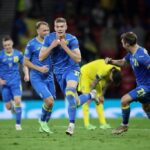 Artem Dovbyk from Ukraine celebrates after scoring against Sweden in the playoffs of the 2020 Euros. Featured image of the World Cup playoffs primer