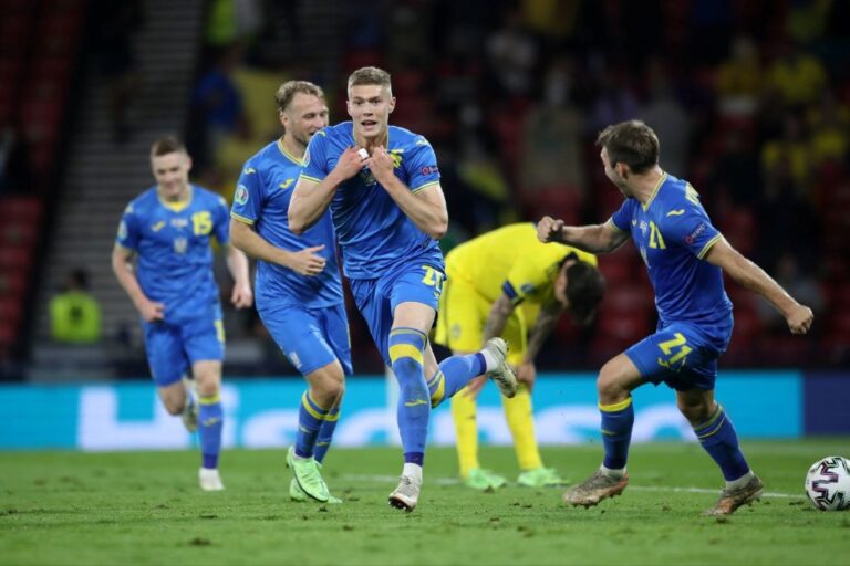 Artem Dovbyk from Ukraine celebrates after scoring against Sweden in the playoffs of the 2020 Euros. Featured image of the World Cup playoffs primer