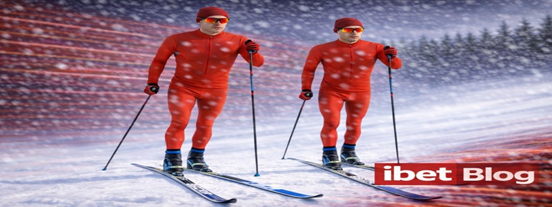 Two cross-country skiers in red uniforms in the middle of a snowstorm. cross country skiing betting featured banner.