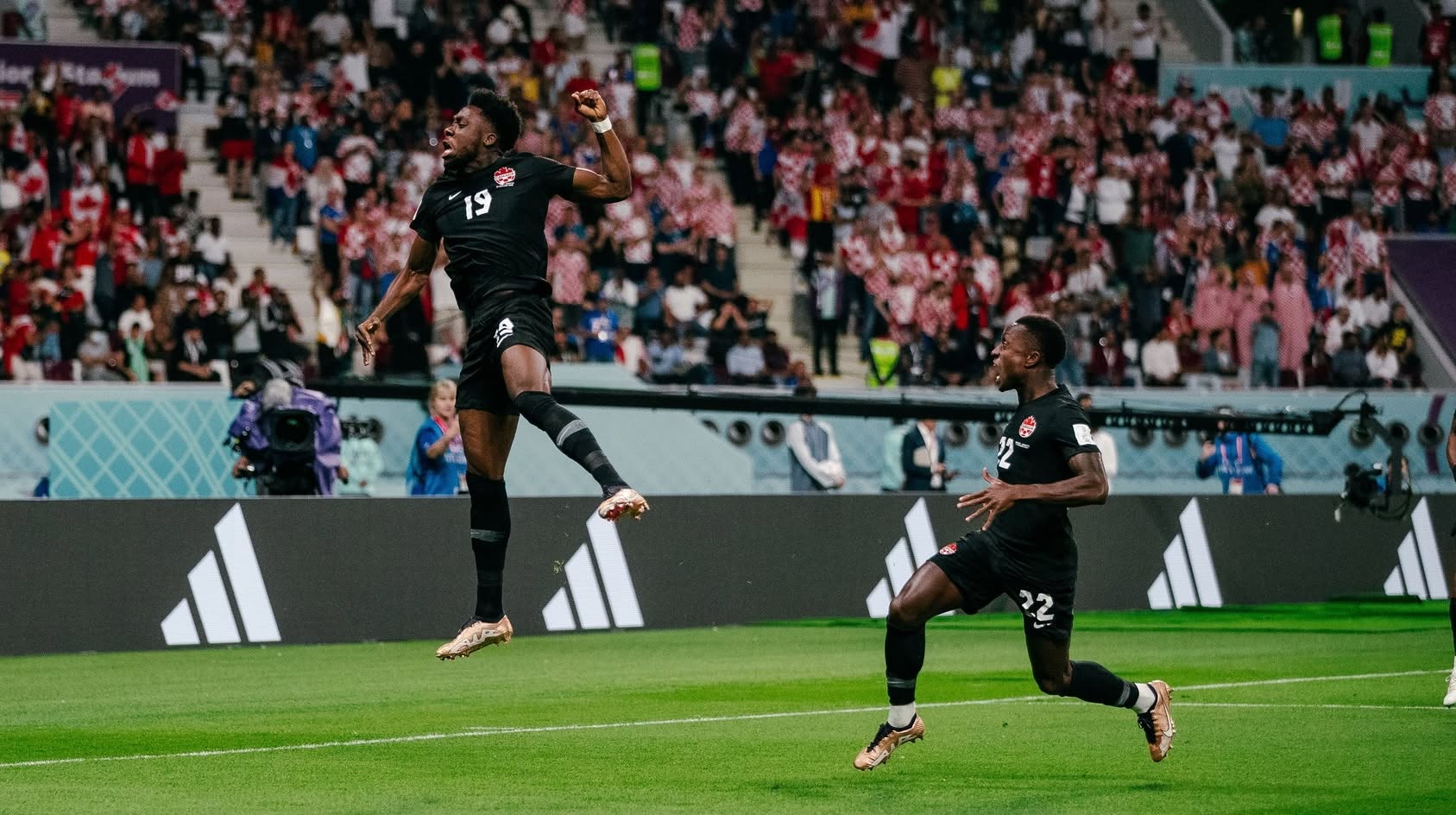 Alphonso Davies celebrates his goal during Canada's World Cup 2022 game against Croatia. Croatia beat Canada 4-1. World Cup 2026 tips for day 1 & 2 featured image.